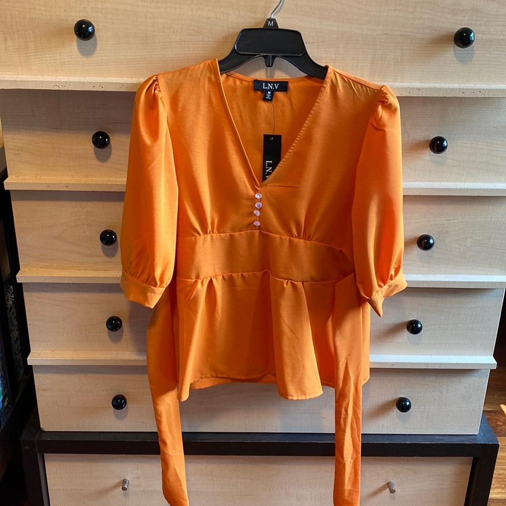 NWT L.N.V orange colored top.